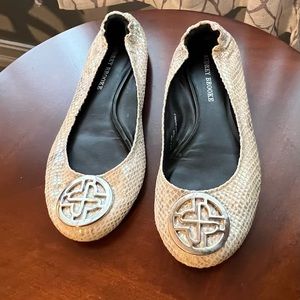 COPY - Audrey Brooke iridescent champagne colored flats with silver logo accent